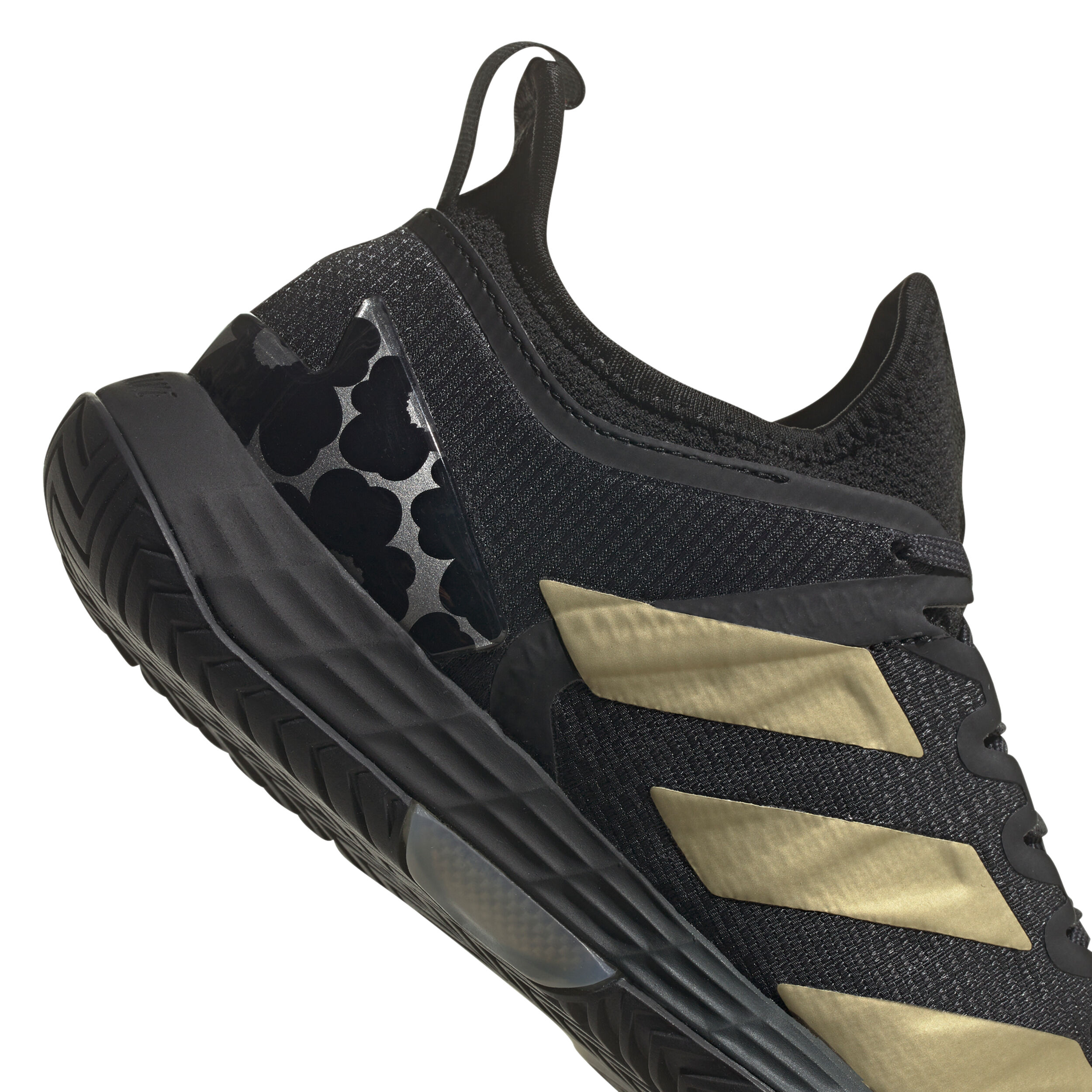 Adidas black and gold tennis shoes top