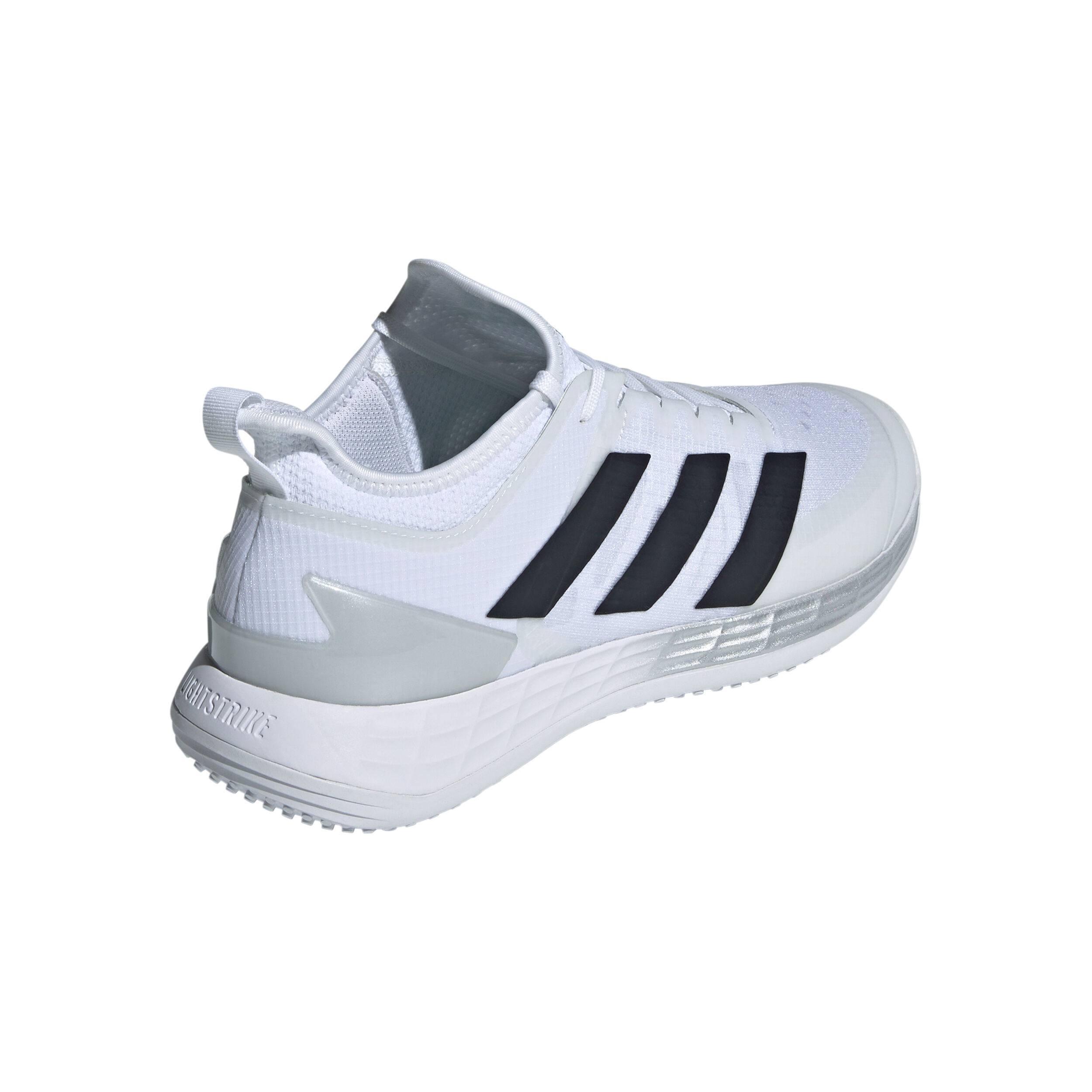 Adidas tennis shoes top grass