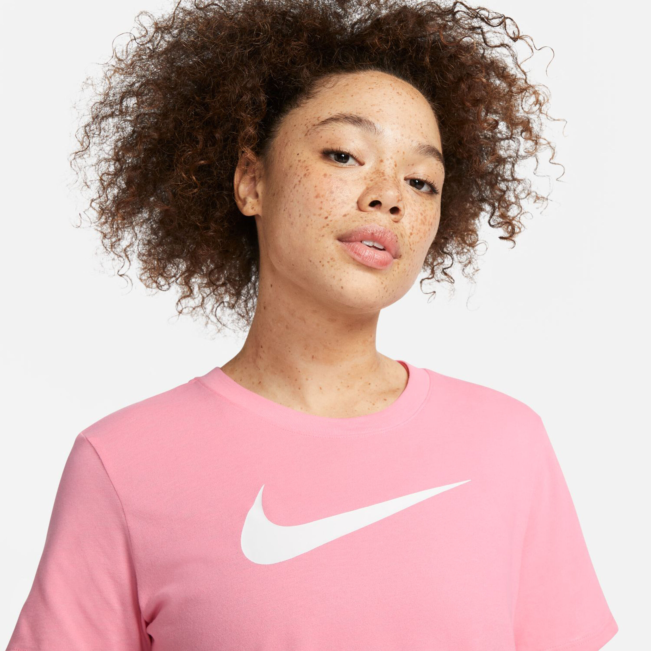 Nike pink swoosh t shirt sales