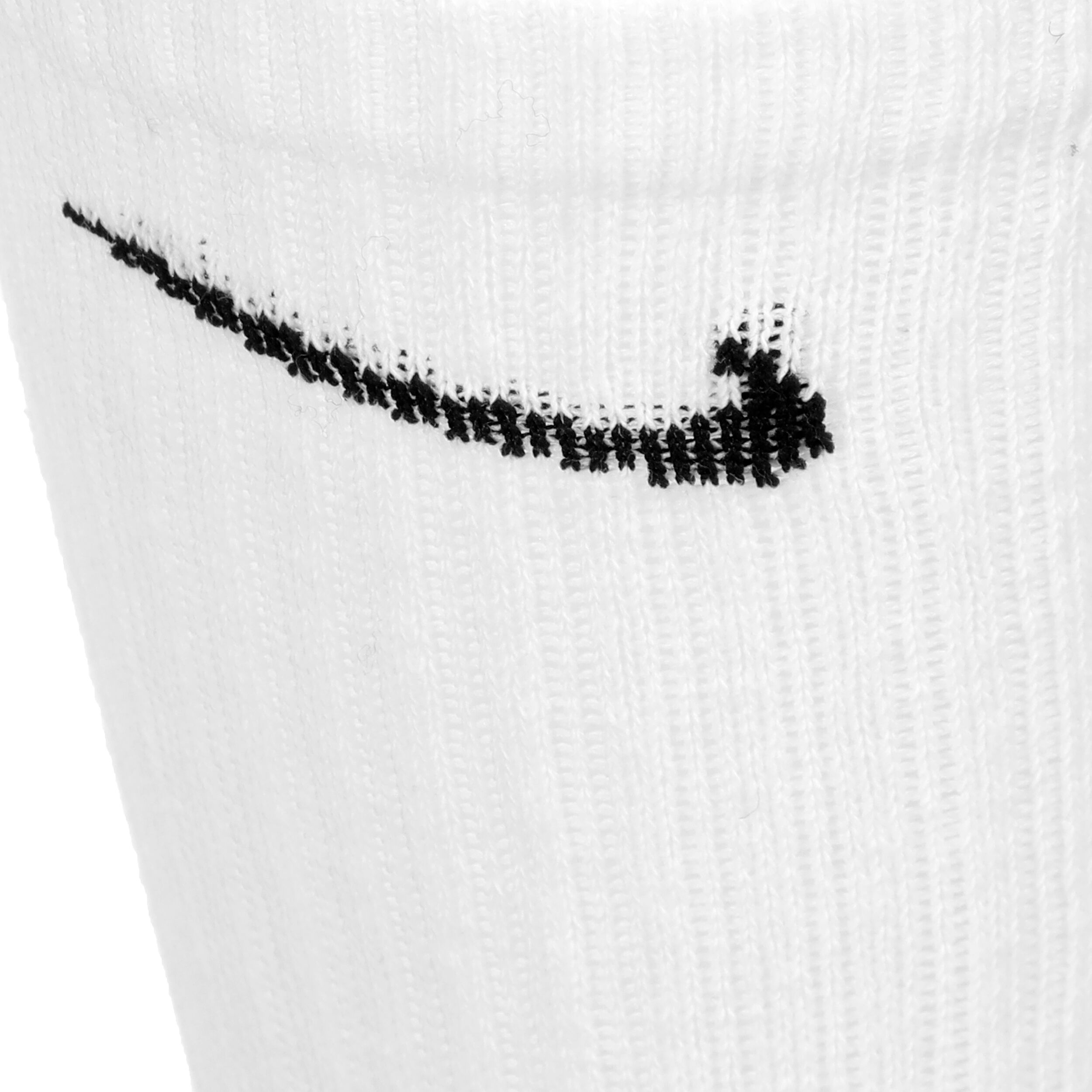 White nike socks top with black swoosh