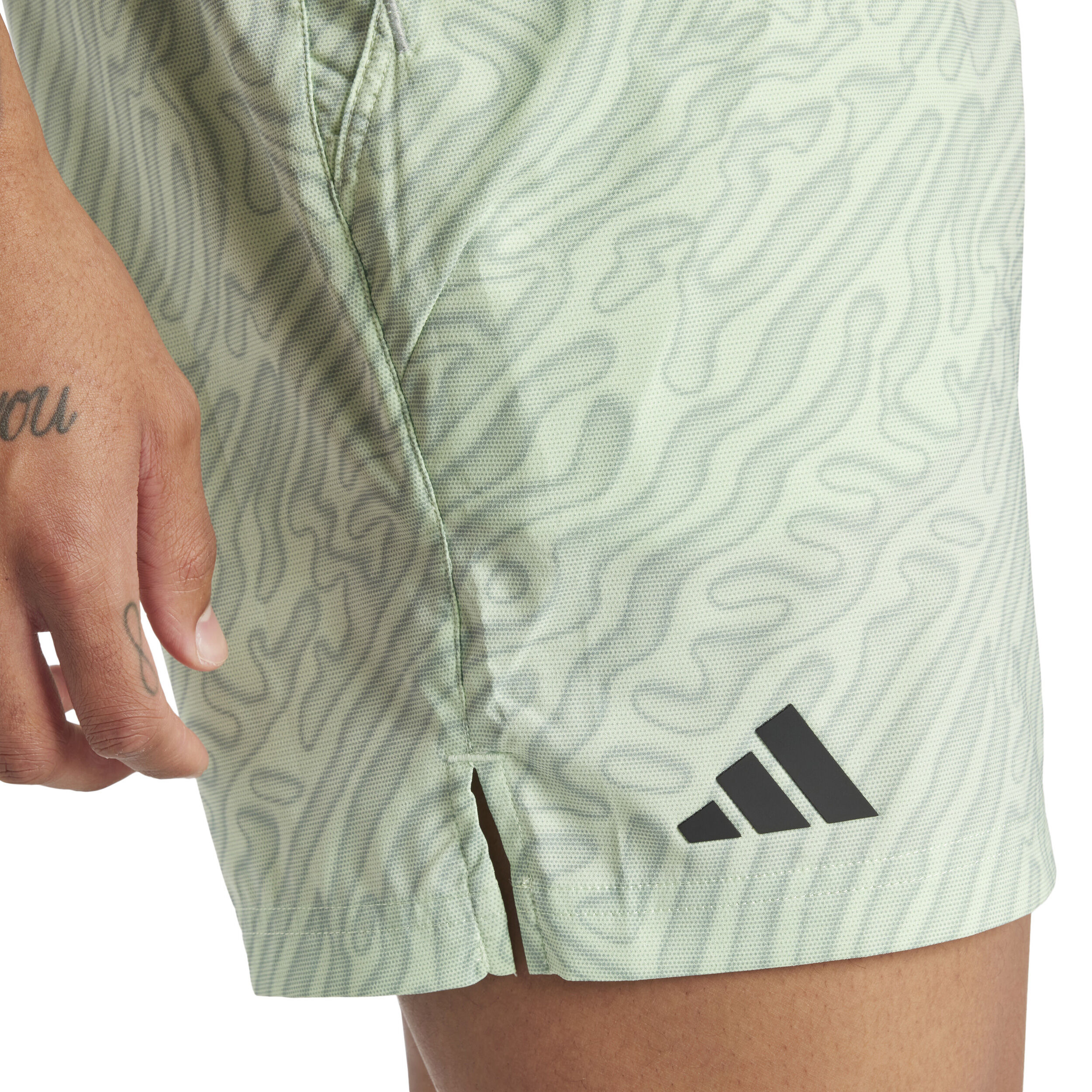 Adidas tennis shorts best sale with pockets