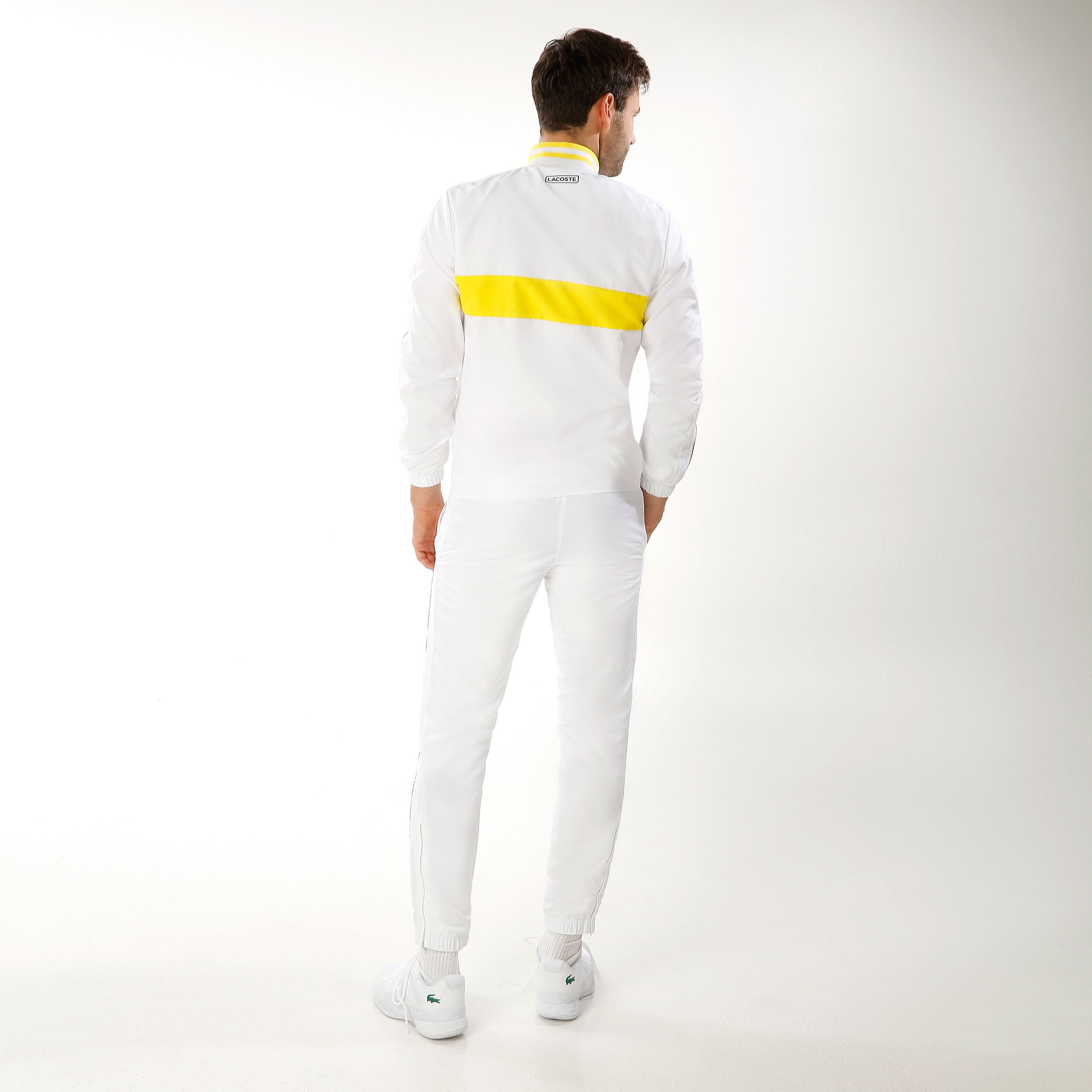 Yellow and white tracksuit on sale