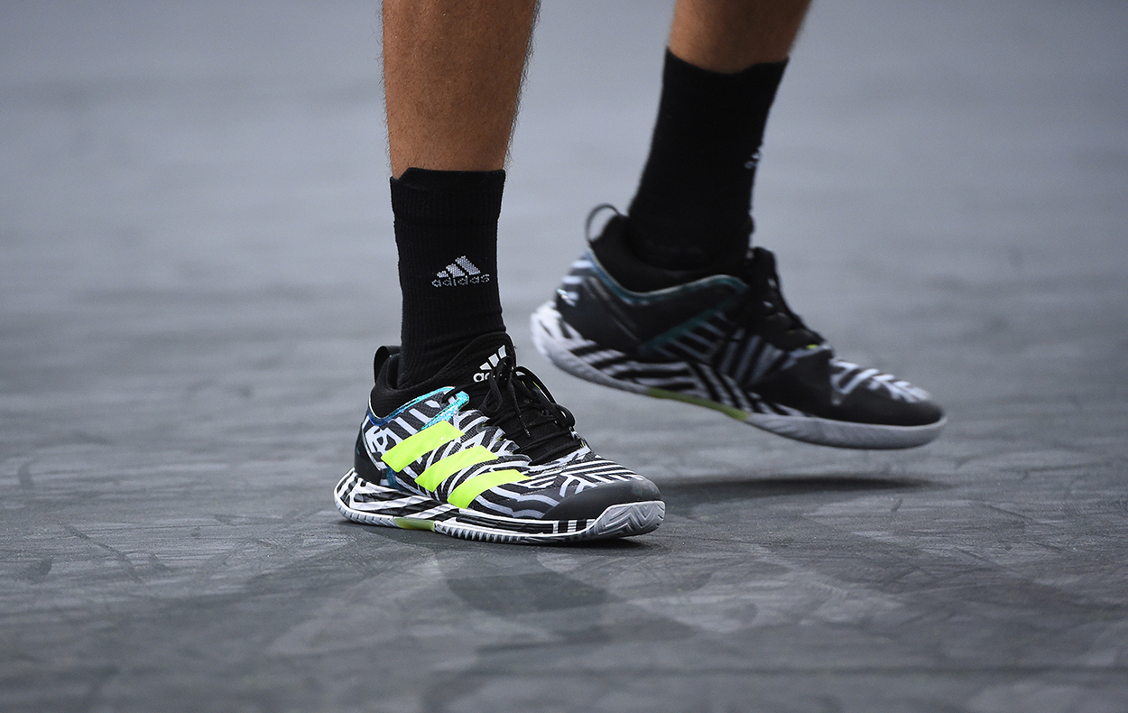 adizero Ubersonic 4 HEAT Black/Silver Men's Shoe - Tennis Topia